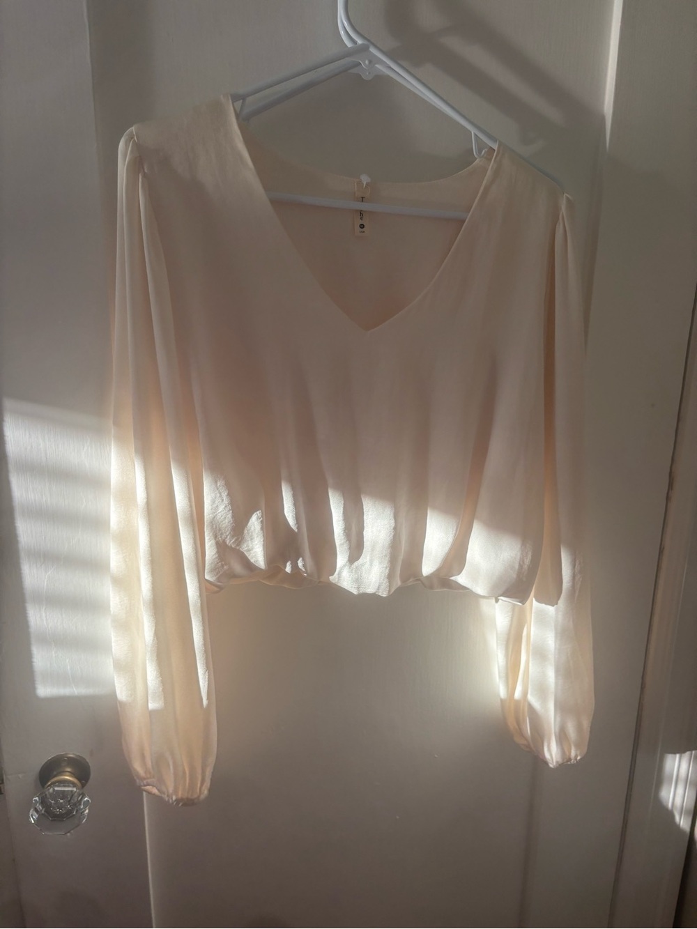 Tyche Soft Ivory Long-Sleeve Blouse
